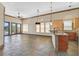 Spacious living area with slate floors, large windows, high ceilings, and an open layout at 12 Via Ravello, Henderson, NV 89011