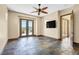 Primary bedroom with beautiful view of outdoor landscape, access to patio at 12 Via Ravello, Henderson, NV 89011
