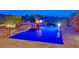 Inviting backyard pool with waterfall feature and beautiful landscaping, perfect for outdoor relaxation at 12 Via Ravello, Henderson, NV 89011