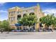 Elegant restaurant exterior with outdoor seating, balconies, and attractive architectural details at 12 Via Ravello, Henderson, NV 89011