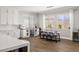 Bright dining area with a refreshment bar and backyard views at 12024 Girasole Ave, Las Vegas, NV 89138