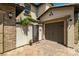 This charming home features a private gated entry leading to a detached single car garage at 12024 Girasole Ave, Las Vegas, NV 89138
