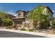 Charming home with well-maintained landscaping, a two-car garage, and attractive exterior finishes at 12024 Girasole Ave, Las Vegas, NV 89138