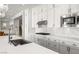 Well-appointed kitchen with modern appliances, gray cabinetry, and a white countertop, perfect for cooking at 12024 Girasole Ave, Las Vegas, NV 89138
