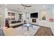 The living room features a cozy fireplace and outdoor views at 12024 Girasole Ave, Las Vegas, NV 89138