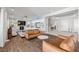 Spacious living room boasts a fireplace, wood floors, and bright, neutral decor at 12024 Girasole Ave, Las Vegas, NV 89138