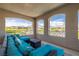 Inviting outdoor patio with comfortable seating and beautiful views of the surrounding landscape at 12024 Girasole Ave, Las Vegas, NV 89138