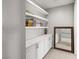 Hallway with storage featuring drawers and shelving with mirror at 12024 Girasole Ave, Las Vegas, NV 89138