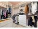 Well-organized walk-in closet featuring ample shelving, hanging space, and a variety of storage options at 12024 Girasole Ave, Las Vegas, NV 89138