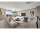 Bonus room featuring sliding glass doors, an outside balcony, and neutral carpet at 12125 Edgehurst Ct, Las Vegas, NV 89138