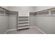 Walk-in closet with ample shelving and hanging space at 12125 Edgehurst Ct, Las Vegas, NV 89138