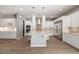 Spacious kitchen boasts a large island, stainless steel appliances, and plenty of cabinet space at 12125 Edgehurst Ct, Las Vegas, NV 89138