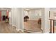 Open hallway showcasing hardwood floors, architectural details, and inviting living spaces at 1265 Vietti St, Henderson, NV 89012