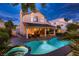 Inviting backyard with pool, hot tub, and covered patio, ideal for relaxing and entertaining at 13 Cozy Glen Cir, Henderson, NV 89074