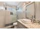 Modern bathroom with stylish finishes, updated vanity, and tiled shower at 13 Cozy Glen Cir, Henderson, NV 89074