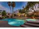 Beautiful pool with hot tub and mature landscaping for ultimate relaxation and privacy at 13 Cozy Glen Cir, Henderson, NV 89074