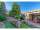 Backyard featuring a water fountain, green plants, and cozy patio seating at 17 Chatmoss Rd, Henderson, NV 89052