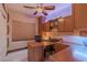 Comfortable home office featuring custom built-ins, ample desk space, and natural light at 17 Chatmoss Rd, Henderson, NV 89052
