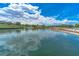 A scenic community lake with lush greenery and waterfront views at 17 Chatmoss Rd, Henderson, NV 89052
