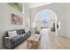 Open-concept living room features tile floors, soaring ceilings, and natural light throughout at 1707 Navarre Ln, Henderson, NV 89014