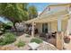 Spacious covered patio and relaxing hammock area, perfect for outdoor entertaining and relaxation at 1707 Navarre Ln, Henderson, NV 89014