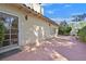 Wide backyard view showing the home's exterior with sliding glass doors to the interior at 1901 Calle De Espana, Las Vegas, NV 89102