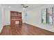 Bedroom with desk, cabinetry, hardwood floors, ceiling fan and window with exterior view at 1901 Calle De Espana, Las Vegas, NV 89102