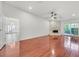 Spacious living room featuring hardwood floors and a stone fireplace at 1901 Calle De Espana, Las Vegas, NV 89102