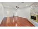 Open living room offers hardwood floors and stone fireplace at 1901 Calle De Espana, Las Vegas, NV 89102