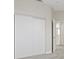Bedroom with closet and en-suite bath featuring neutral colors at 1909 Falling Tree Ave, North Las Vegas, NV 89031