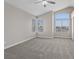 Bedroom with carpet, neutral walls and multiple windows at 1909 Falling Tree Ave, North Las Vegas, NV 89031
