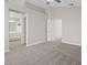 Bedroom with high ceilings, carpet and bathroom access at 1909 Falling Tree Ave, North Las Vegas, NV 89031