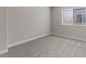 Bedroom with carpet and window with blinds at 1909 Falling Tree Ave, North Las Vegas, NV 89031