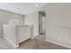 View of second story loft with neutral walls, carpet and cabinets at 1909 Falling Tree Ave, North Las Vegas, NV 89031