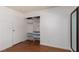 Bedroom with open closet, built-in shelving and drawers for storage solutions at 1911 Venalynne St, Las Vegas, NV 89156