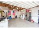 A large and organized garage space with laundry machines and additional storage options, perfect for a workshop at 1911 Venalynne St, Las Vegas, NV 89156