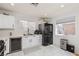 Bright kitchen featuring white cabinets, stainless steel appliances, and great natural light at 1911 Venalynne St, Las Vegas, NV 89156