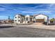 Captivating home features a beautiful façade, meticulously landscaped front yard, and a spacious driveway at 210 E Longacres Dr, Henderson, NV 89015