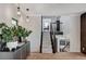 Entryway with pendant lighting and modern staircase at 210 E Longacres Dr, Henderson, NV 89015
