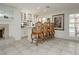 Stylish bar area with a built-in bar, seating, and ample cabinet space for storage and display at 2255 S Buffalo Dr, Las Vegas, NV 89117