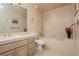 Clean bathroom featuring a vanity with marble countertops and a combined tub and shower at 2255 S Buffalo Dr, Las Vegas, NV 89117
