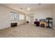 Spacious bedroom with a ceiling fan and sliding glass door at 2255 S Buffalo Dr, Las Vegas, NV 89117
