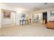 Bedroom with large mirrored closet doors, globe, and patterned carpet at 2255 S Buffalo Dr, Las Vegas, NV 89117