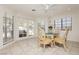 Cozy breakfast nook with French doors and large windows providing natural light and outdoor views at 2255 S Buffalo Dr, Las Vegas, NV 89117