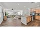 Open-concept living space featuring hardwood floors, natural light, and modern finishes at 2885 Timber Country Rd, North Las Vegas, NV 89086
