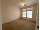 Bright bedroom with neutral walls and a window offering natural light and outdoor views at 3004 Darby Falls Dr, Las Vegas, NV 89134