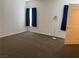 Bedroom with neutral walls, carpet, and two windows, offering natural light and space at 311 Manti Pl # 311, Henderson, NV 89014