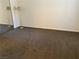 Bedroom with carpeting, mirror closet doors, and bright lighting at 311 Manti Pl # 311, Henderson, NV 89014
