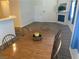The dining room leads to the Gathering room with a fireplace and tile floors at 311 Manti Pl # 311, Henderson, NV 89014
