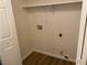 The laundry room has space for a washer and dryer with a shelf above at 311 Manti Pl # 311, Henderson, NV 89014